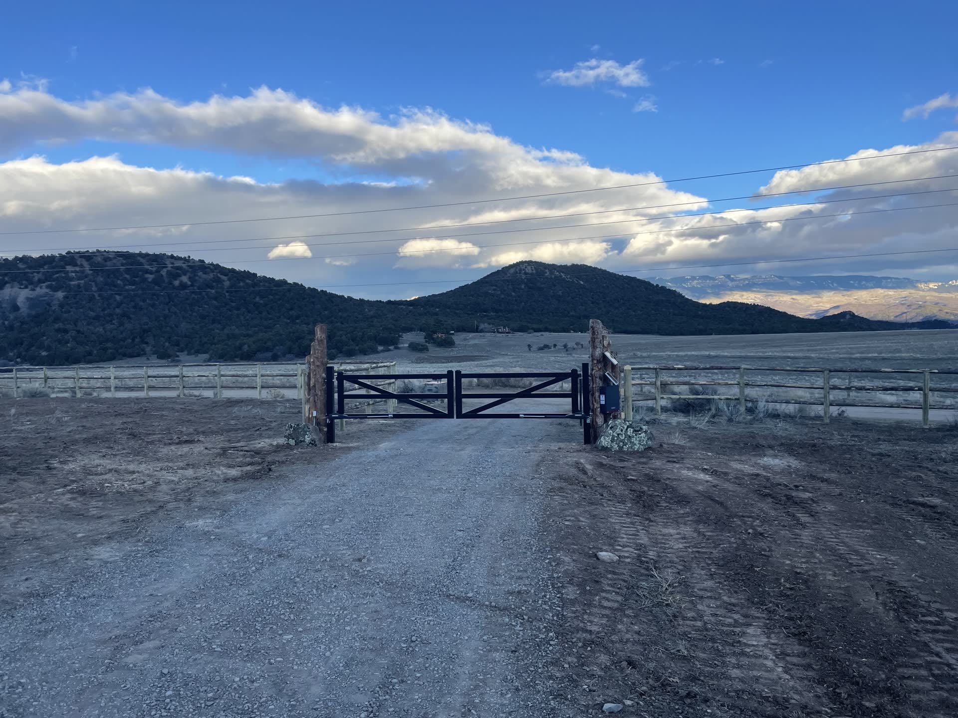 Ranch entrance with wooden fencing